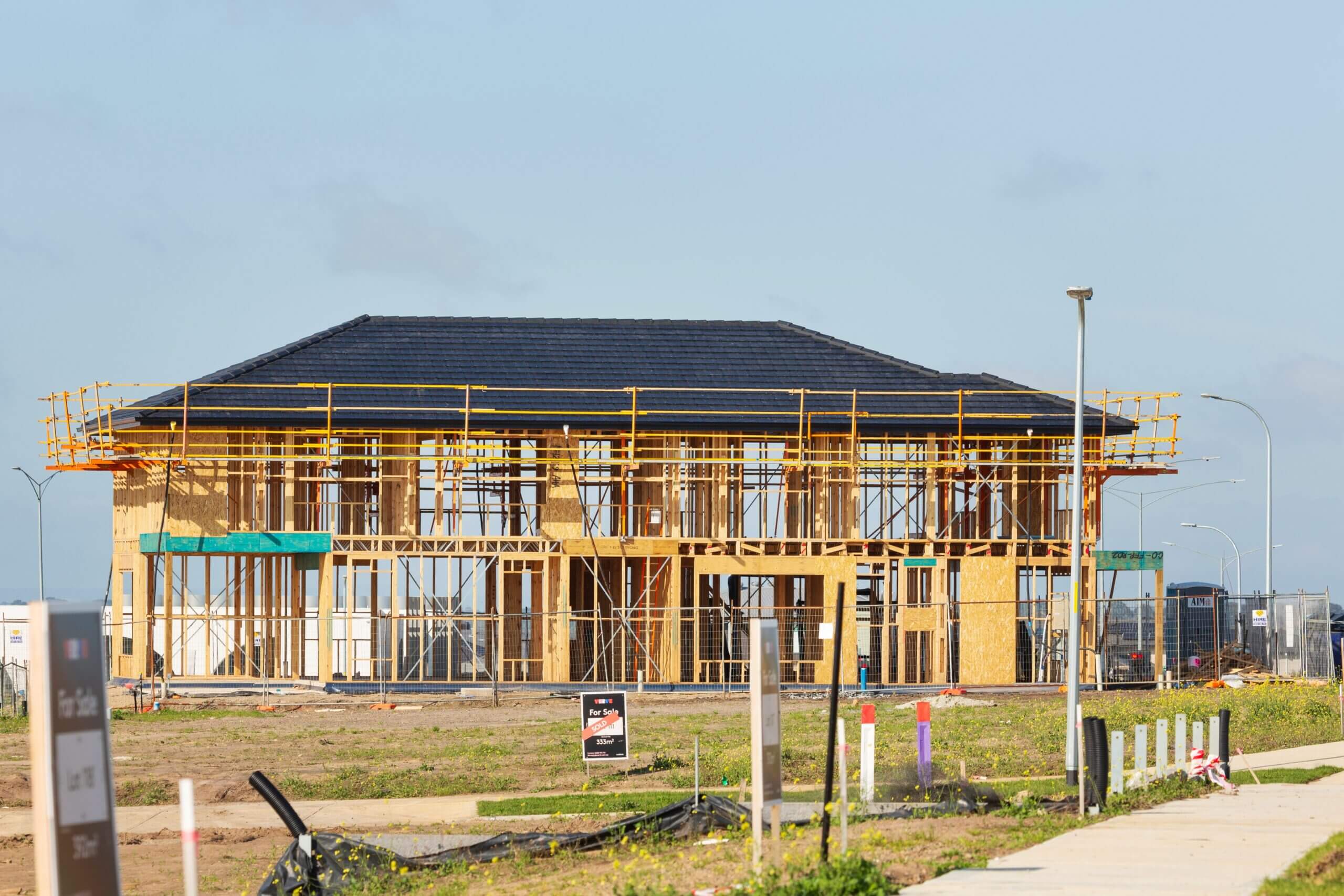 New house under construction with scaffolding
